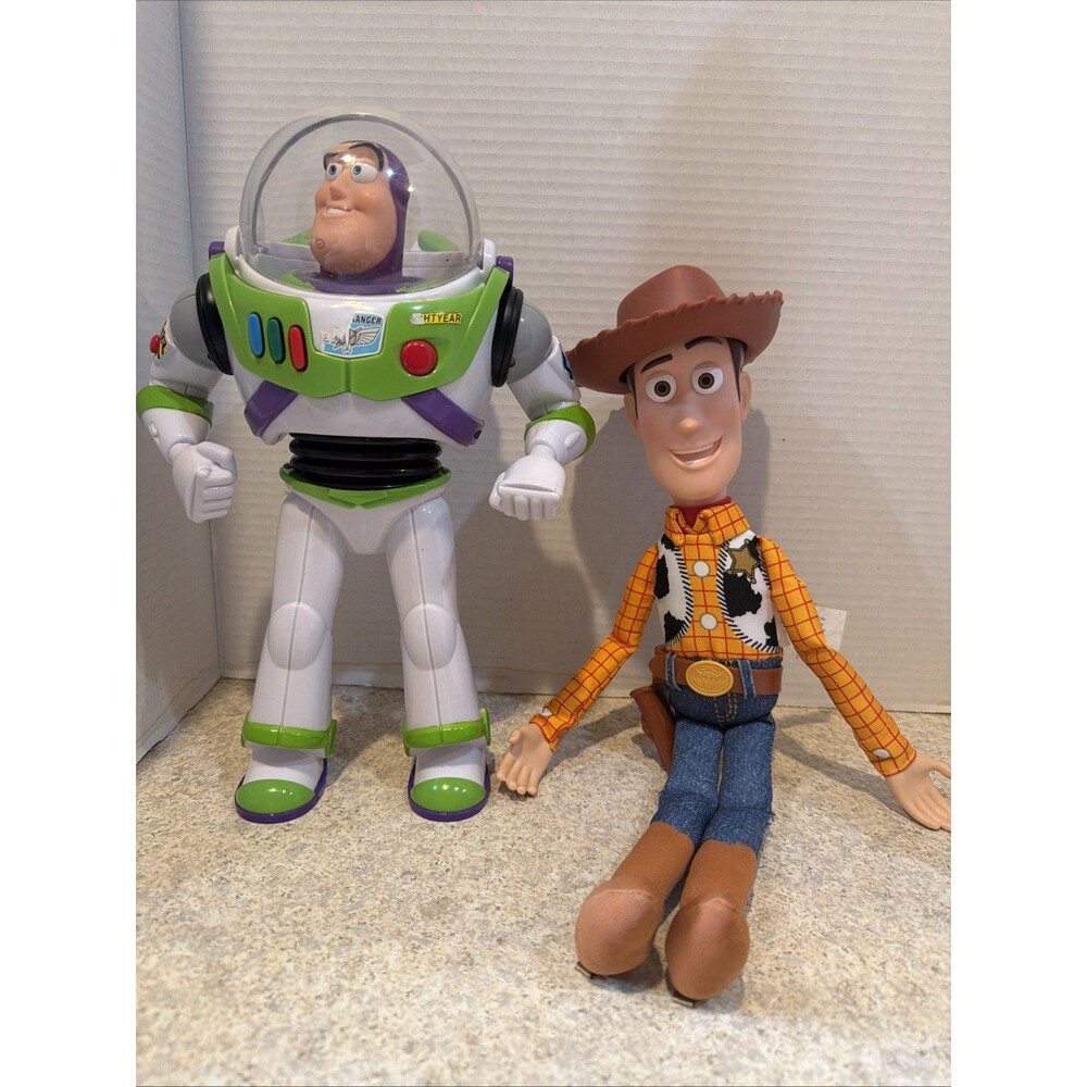 Buzz light year 12” and Woody 14” talking Disney Pixar Toy Story figurines